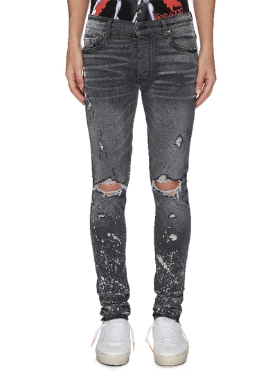 Amiri Thrasher Minus Skinny-fit Distressed Bleach-splattered Stretch-denim Jeans In Gray