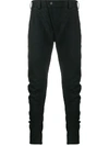 DEVOA TWISTED SKINNY TROUSERS