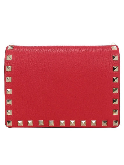 Valentino Garavani Rockstud Embellished Leather Pouch In Rouge Pudre