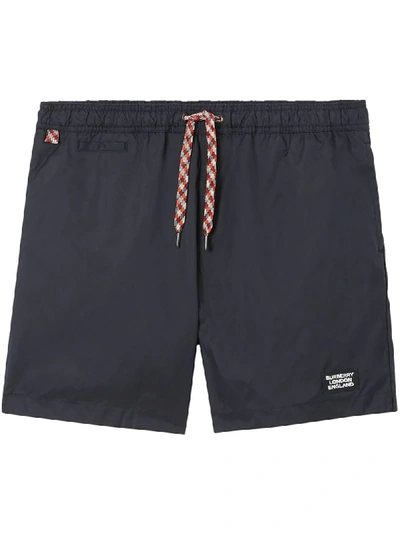 Burberry Logo Appliqué Swim Shorts In Blue