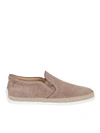 TOD'S TOD'S PERFORATED SUEDE SLIP-ONS IN BEIGE