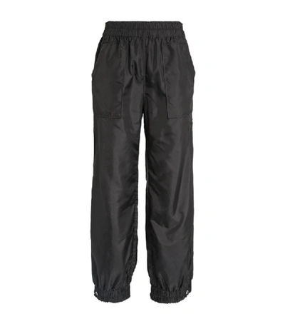 Ganni Crinkled Tech Cargo Trousers In Black