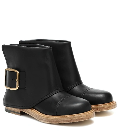 Alexander Mcqueen Buckled Leather Ankle Boots In Black