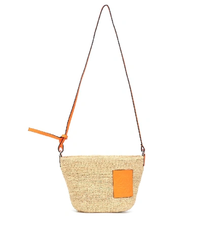 Loewe X Paula's Pochette Raffia And Leather Basket Bag In Natural/neon Orange