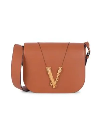 Versace Virtus Leather Saddle Bag In Oud Oro Tibute