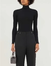 Wolford Turtleneck Fine-rib Merino Wool Jumper In Ecrue