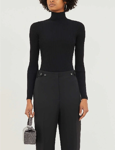 Wolford Ribbed Turtleneck Sweater In Virgin Wool In Black