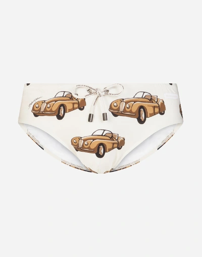 Dolce & Gabbana Swimming Briefs With Small Car Print In Beige