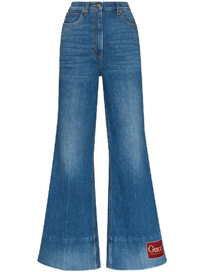 Gucci Logo-patch Flared Denim Jeans In Blue