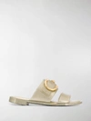 Ferragamo Taryn Buckled Metallic Rubber Slides In Gold