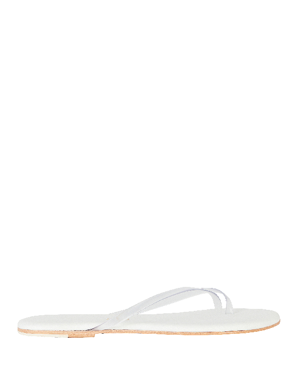 tkees white flip flops