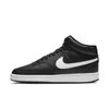 Nike Black Canvas Sb Charge Mid Sneakers