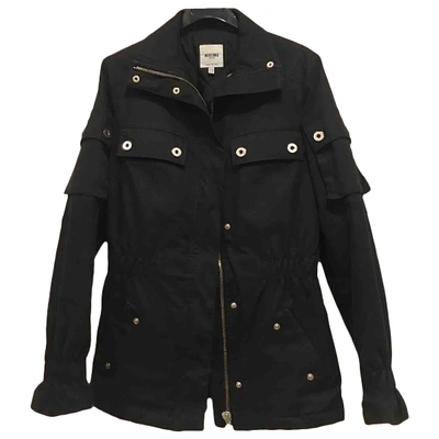 Pre-owned Moschino Cheap And Chic Black Synthetic Coat