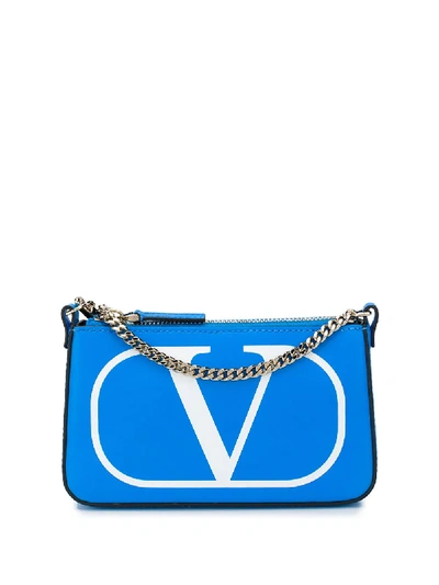 Valentino Garavani Vlogo Logo-print Clutch Bag In Blue