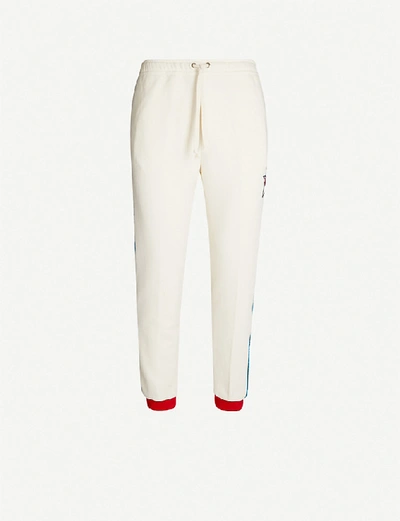 Gucci Side-stripe Cotton Jogging Bottoms In Natural Azure Red