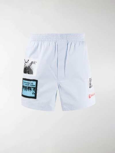 Raf Simons Patched Deck Shorts In Blue