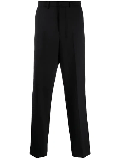 Ami Alexandre Mattiussi Pleated Carrot Fit Trousers In Black