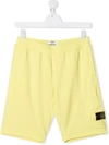 Stone Island Knee Length Logo Patch Shorts In Yellow