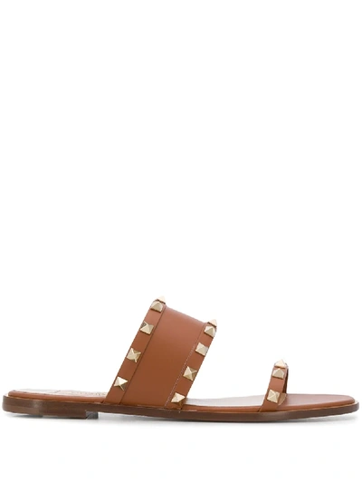 Valentino Garavani Rockstud Slide Sandals In Brown