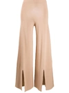 D-EXTERIOR HIGH-WAISTED SLIT TROUSERS