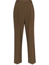 The Frankie Shop Bea Tapered High-rise Stretch-crepe Trousers In Brown