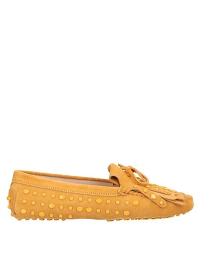 Tod's Fringed Studded Suede Loafers In Marigold