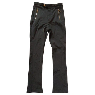 Pre-owned Gucci Black Spandex Trousers