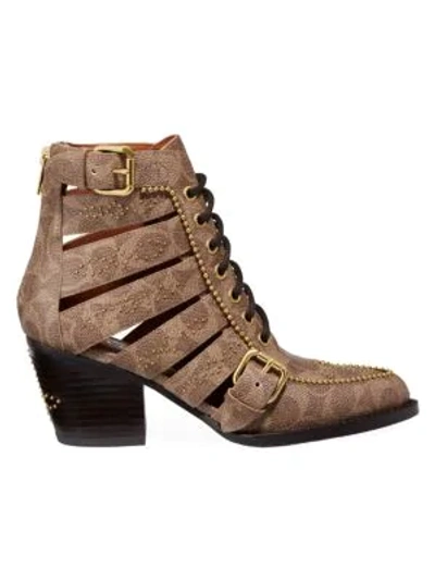 Coach Paisley Studded Cutout Signature Pvc Ankle Boots In Tan