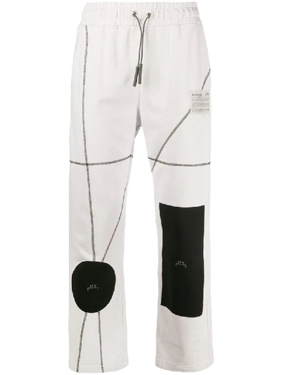 A-cold-wall* Geometric-print Track Pants In Palegrey