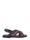 Alexander Mcqueen Cross Strap Sandals In Nero