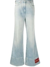 GUCCI GLITTER LOGO FLARED JEANS