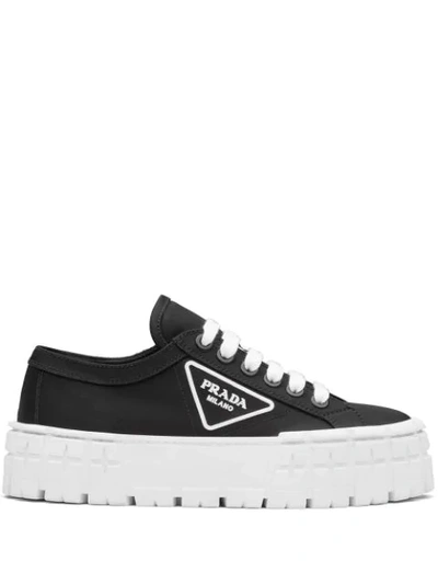 Prada Triangular Logo Plaque Sneakers In Black ,white