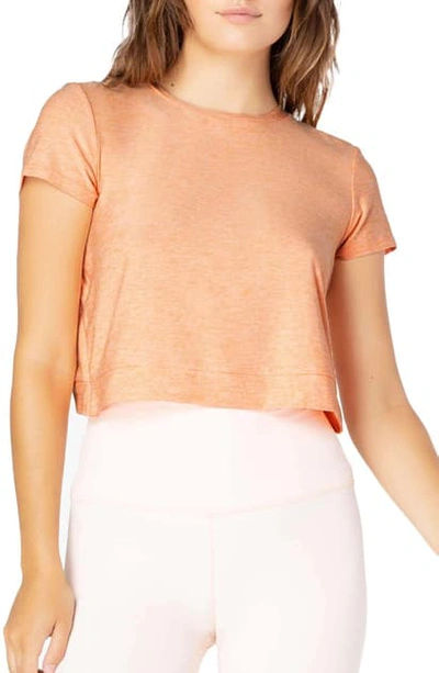 Beyond Yoga Back Out Crop Tee In Sweet Peach-pink Blush