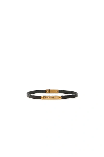Saint Laurent Leather And Burnished Gold-tone Bracelet In Black