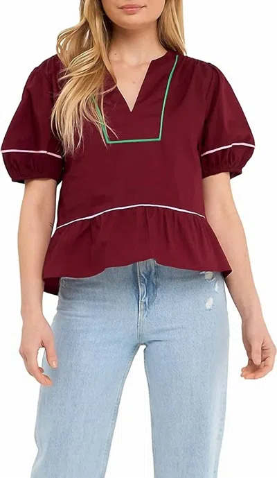 2.7 August Apparel Falling For Maroon Peplum Top In Burgundy In White