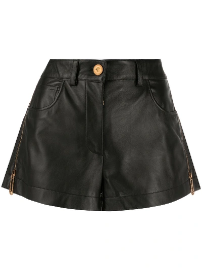 Versace Safety Pin Nappa Leather Shorts In Black
