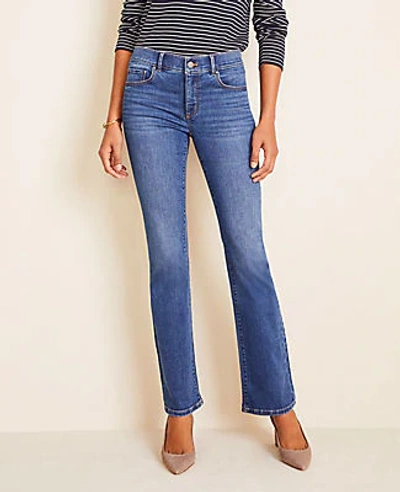 Ann Taylor Curvy Sculpting Pocket Mid Rise Boot Cut Jeans In Mid Stone Wash