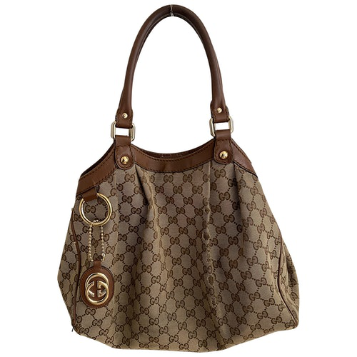 Pre-Owned Gucci Sukey Beige Cloth Handbag | ModeSens