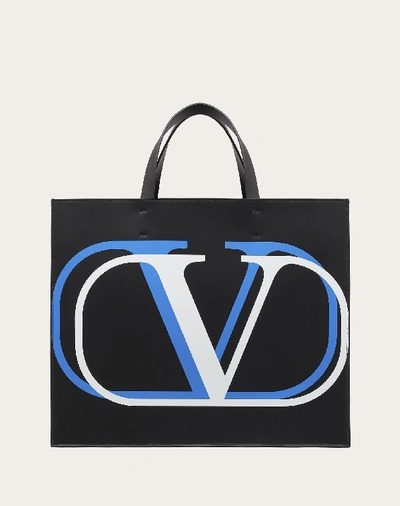 Valentino Garavani Uomo Vlogo Signature Leather Tote Bag In Black/neon Azure