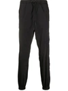 MARCELO BURLON COUNTY OF MILAN CROSS TAPERED TRACK PANTS