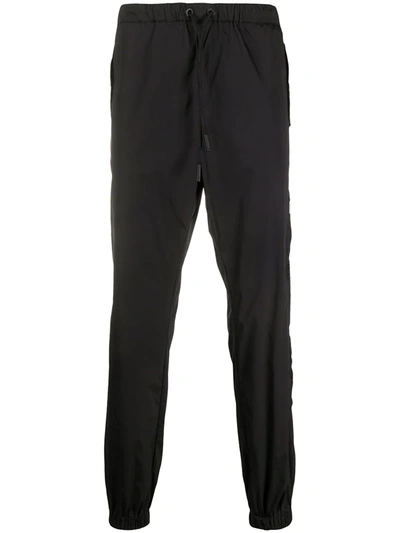 Marcelo Burlon County Of Milan Cross Tapered Track Trousers In Black