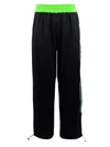 GCDS BLACK AND GREEN TRACK trousers,11416516