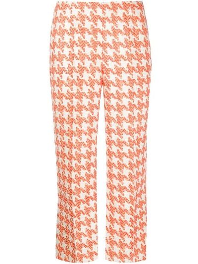 Loulou Cropped Flared Houndstooth Trousers In Orange