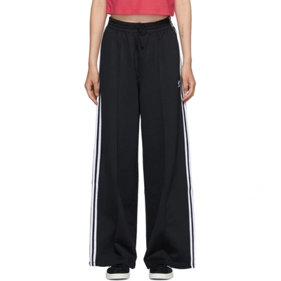 Adidas Originals Striped Stretch-knit Wide-leg Track Trousers In Black