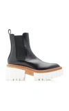 Stella Mccartney Women's Emilie Lug Sole Rubber Boots In White,black