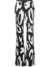 JUST CAVALLI GIANT LEOPARD PRINT FLARED TROUSERS