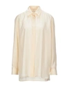 The Row Solid Color Shirts & Blouses In Beige
