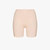 SPANX NUDE THINSTINCTS MID-THIGH SHORTS