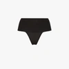 Spanx Undie-tectable Mid-rise Thong In Schwarz