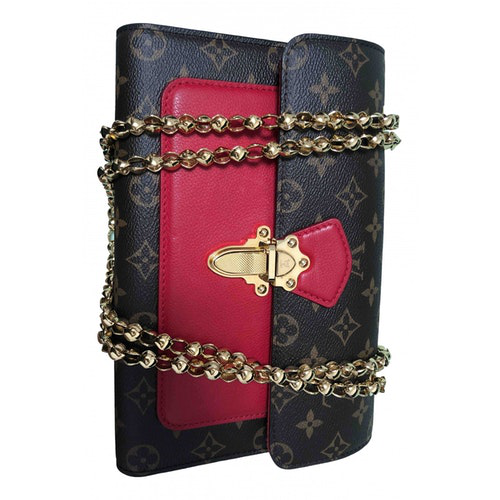 Pre-Owned Louis Vuitton Victoire Red Cloth Clutch Bag | ModeSens